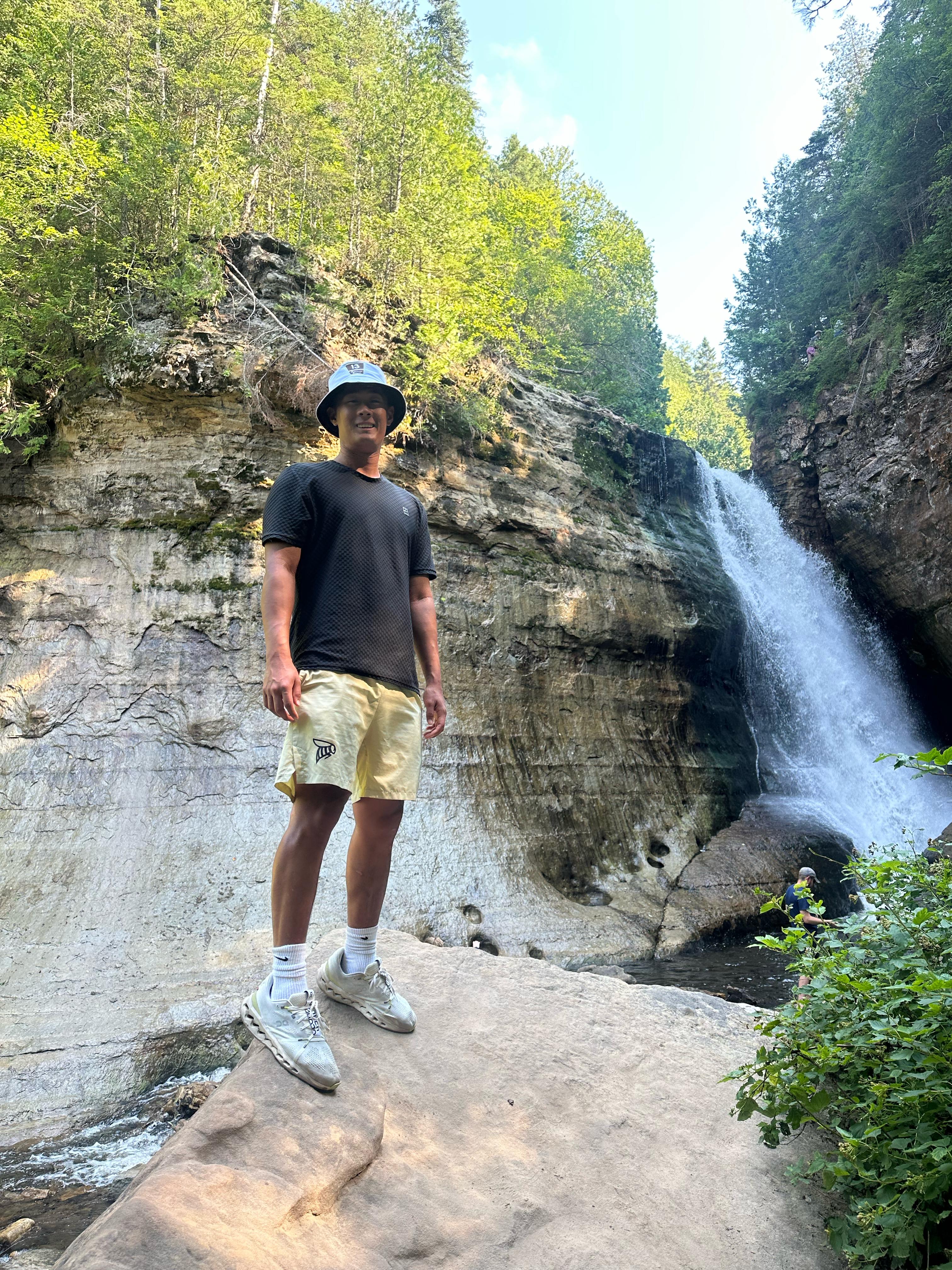 Yu Dian at a waterfall